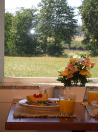 Breakfast overlooking the river in our great room Bistro.